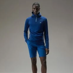Jlindeberg J.Lindeberg Aerial 1/4 Zip Golf Hoodie 9 Jlindeberg J.Lindeberg Aerial 1/4 Zip Golf Hoodie -Golf Sweaters Sales J.Lindeberg AW22 Aerial Quarter Hood GMJS07797 0337 SWLIN085 Navy PeonyAiry Blue Model 1
